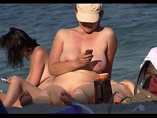 Cheeky nudist babes sunbathing laze about on spy cam